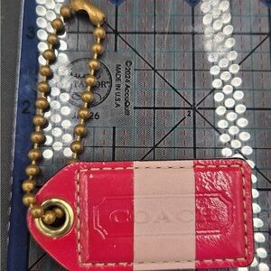 Coach Pink Tag with Gold Chain